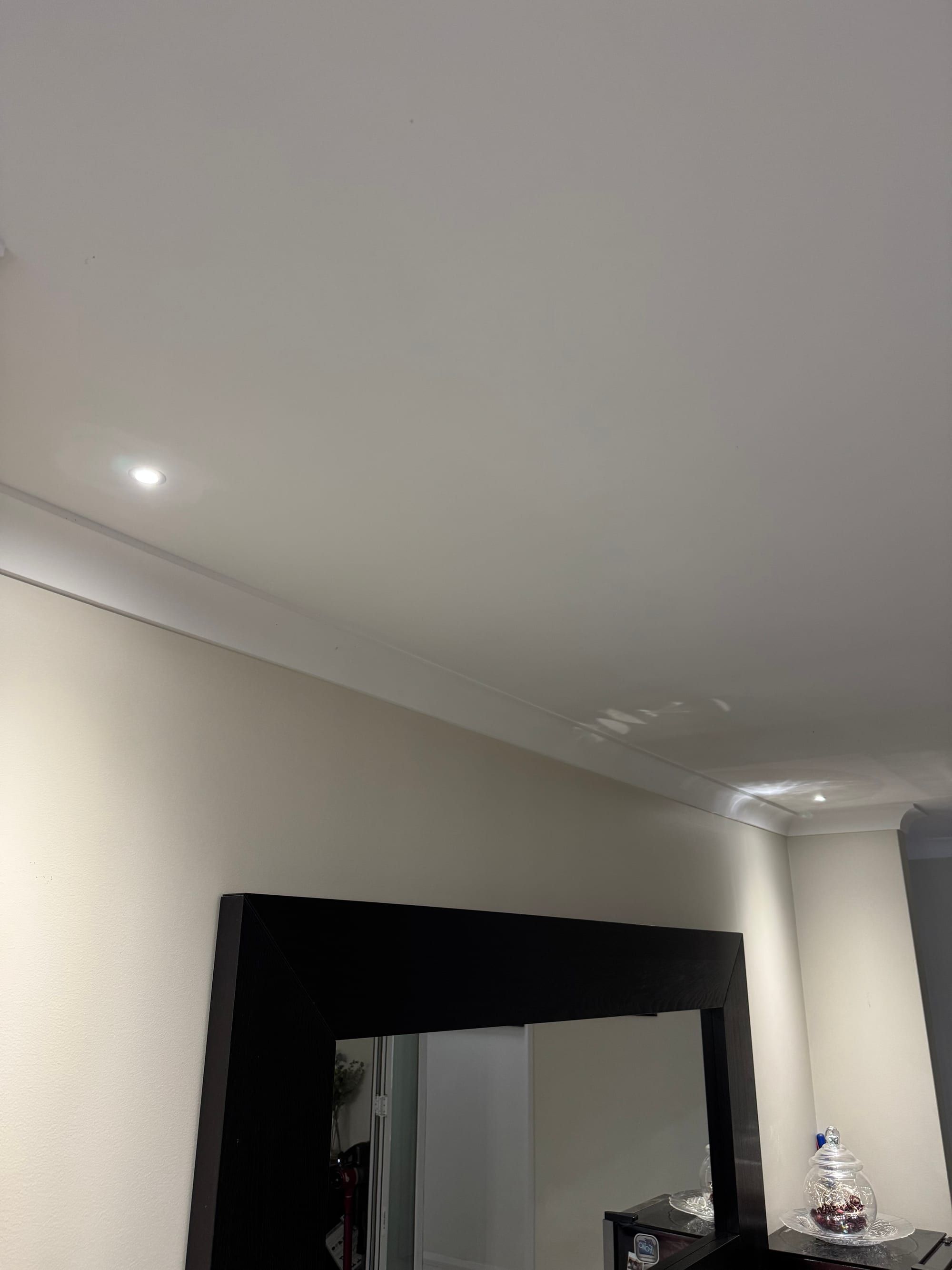 LED feature strip lighting installed under a floating cabinet